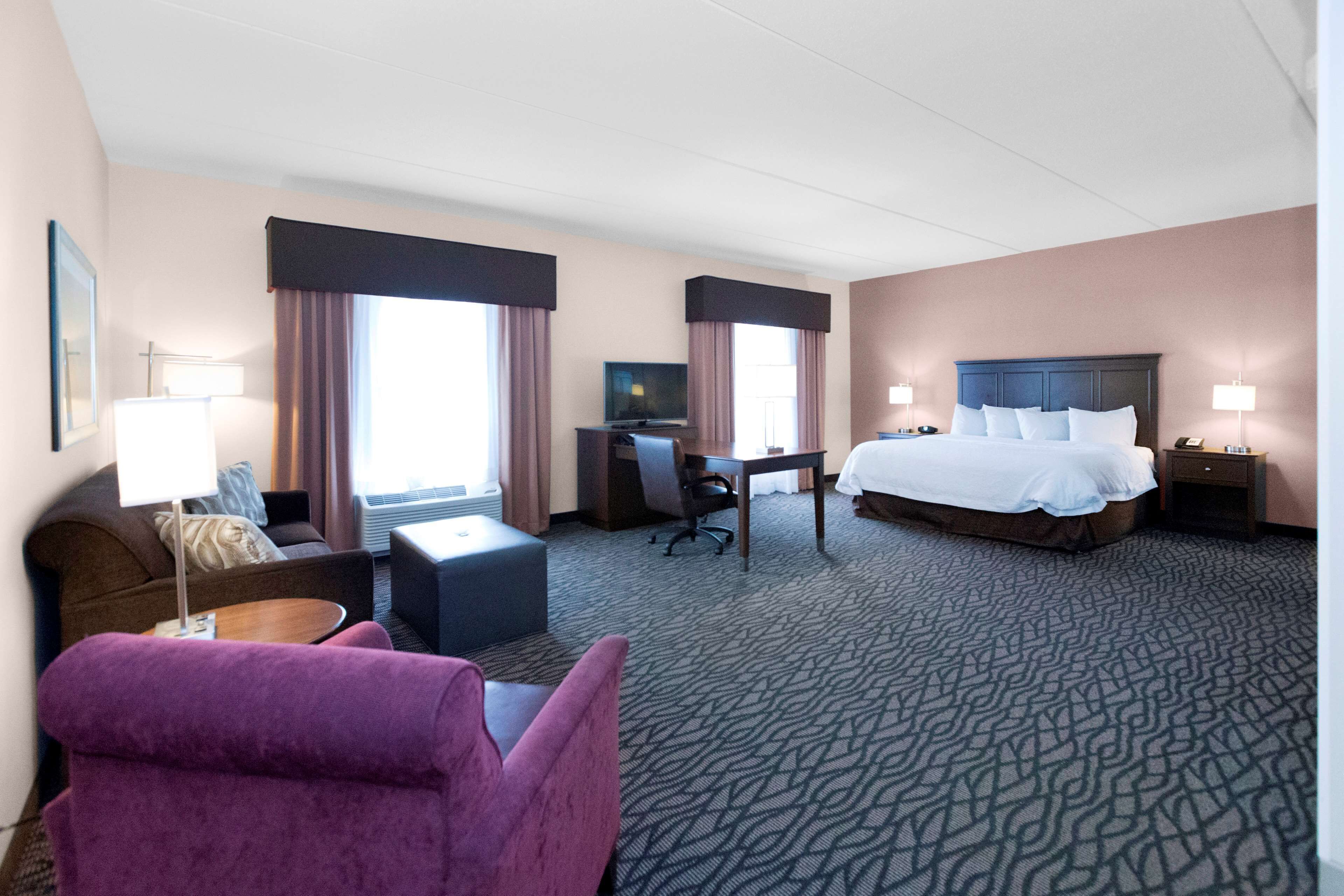 premium bedding, desk, blackout curtains, iron/ironing board