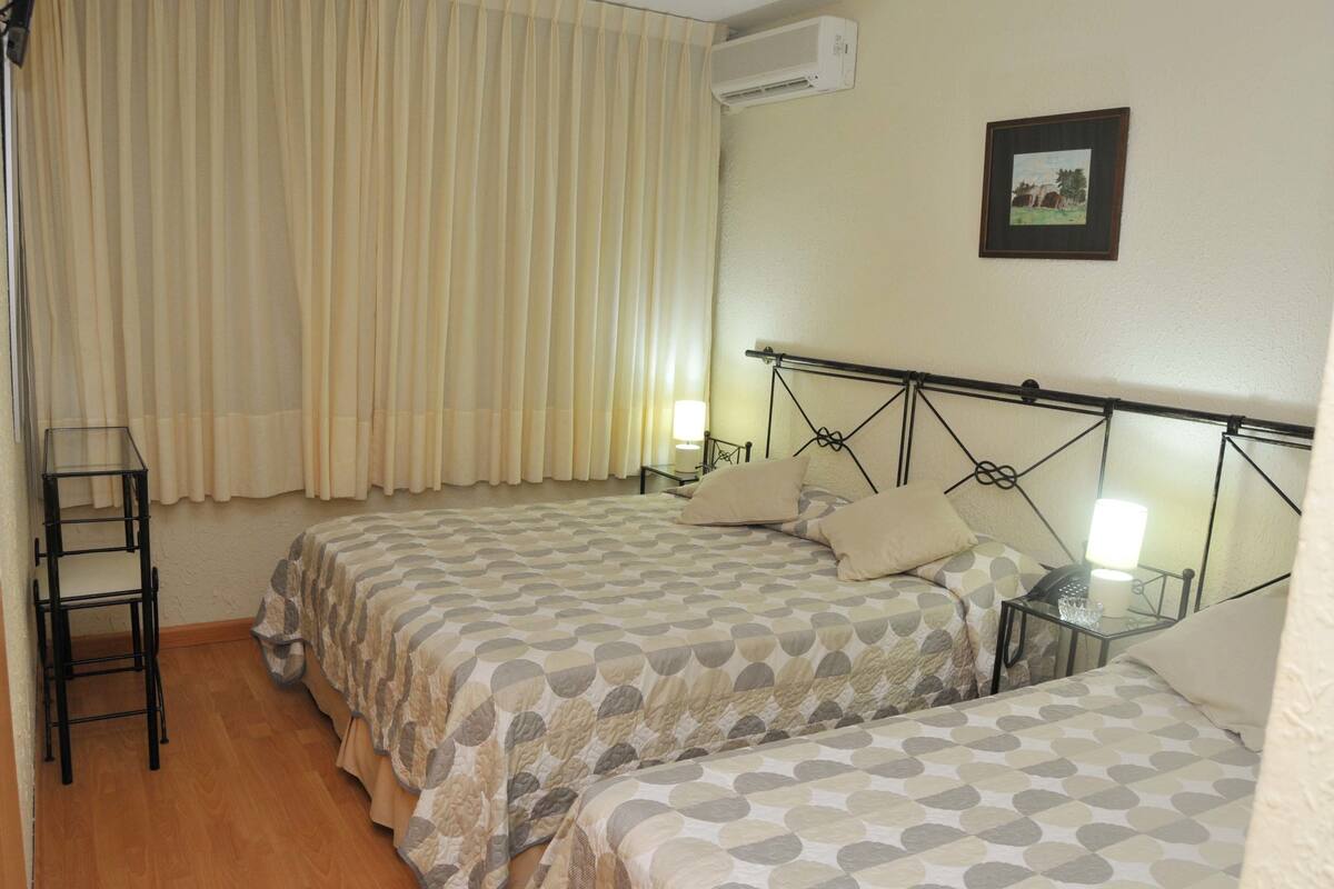 Standard Triple Room | Minibar, in-room safe, free cots/infant beds, rollaway beds