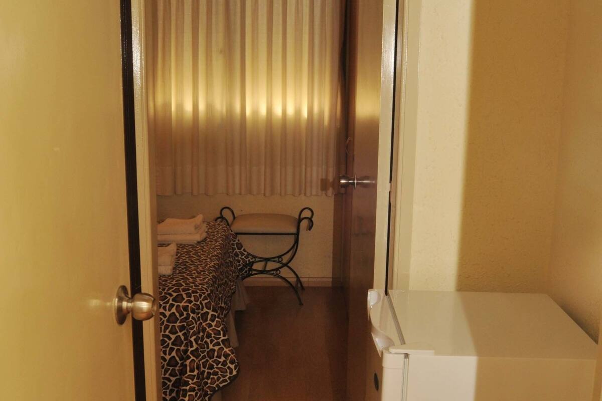 Family Room | Minibar, in-room safe, free cots/infant beds, rollaway beds