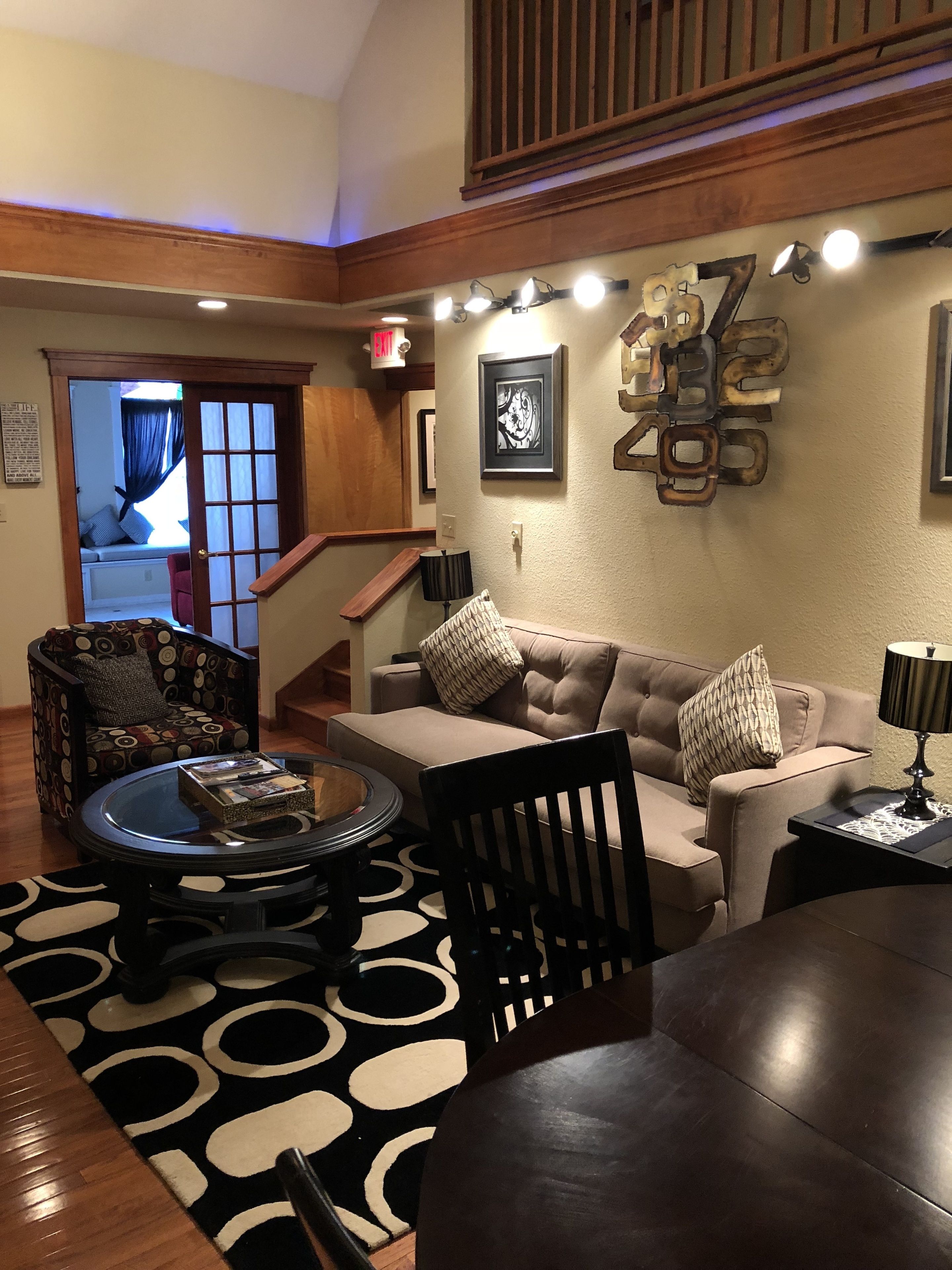 the apartment at briarwood lodge | living area | tv, fireplace