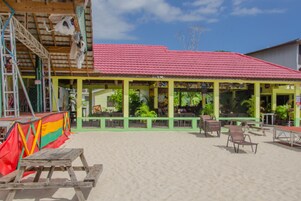 Breakfast, lunch, dinner served; international cuisine, beach views 