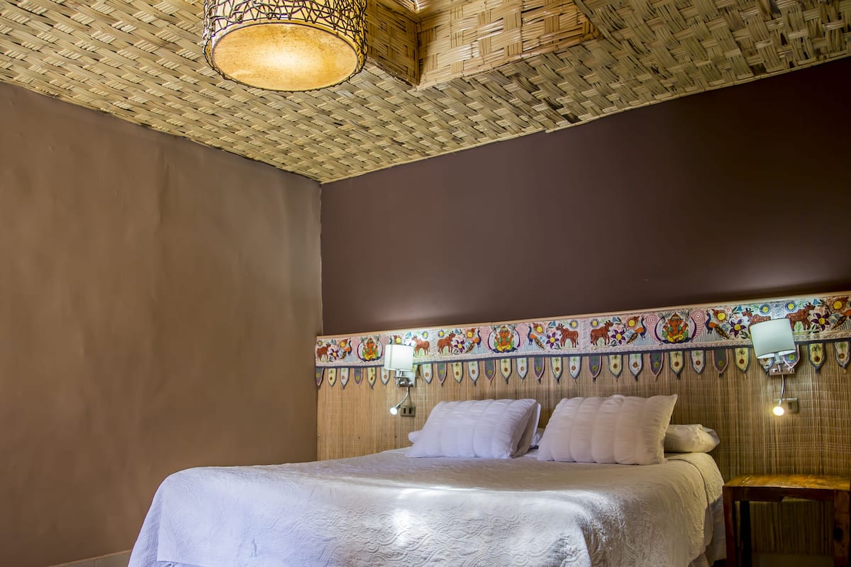 standard double room, 1 queen bed | minibar, individually furnished, blackout curtains, free wifi