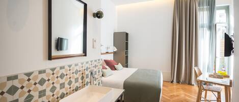 Habitación superior, Terraza | Sábanas de algodón egipcio, ropa de cama de alta calidad y minibar