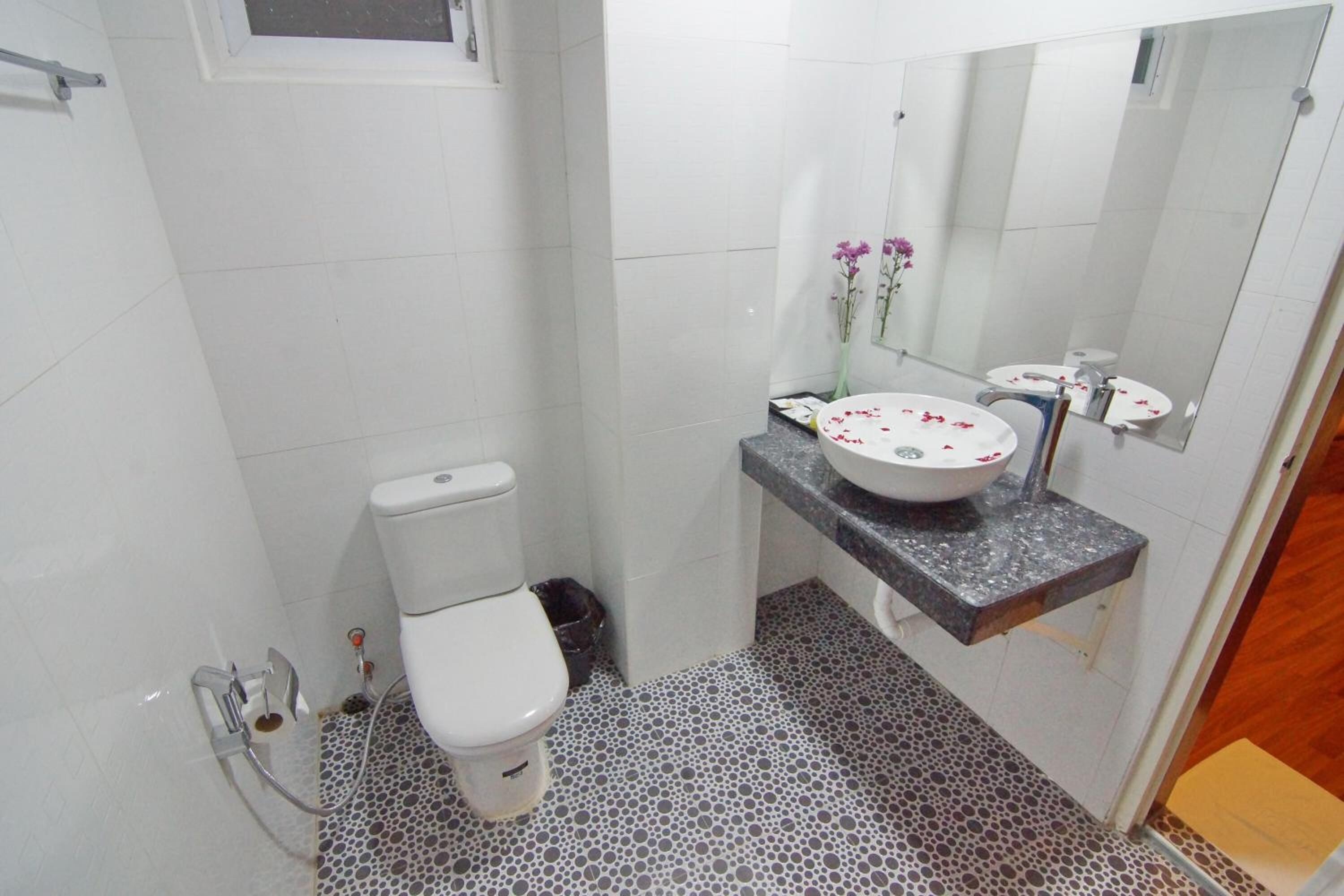 hair dryer, slippers, towels