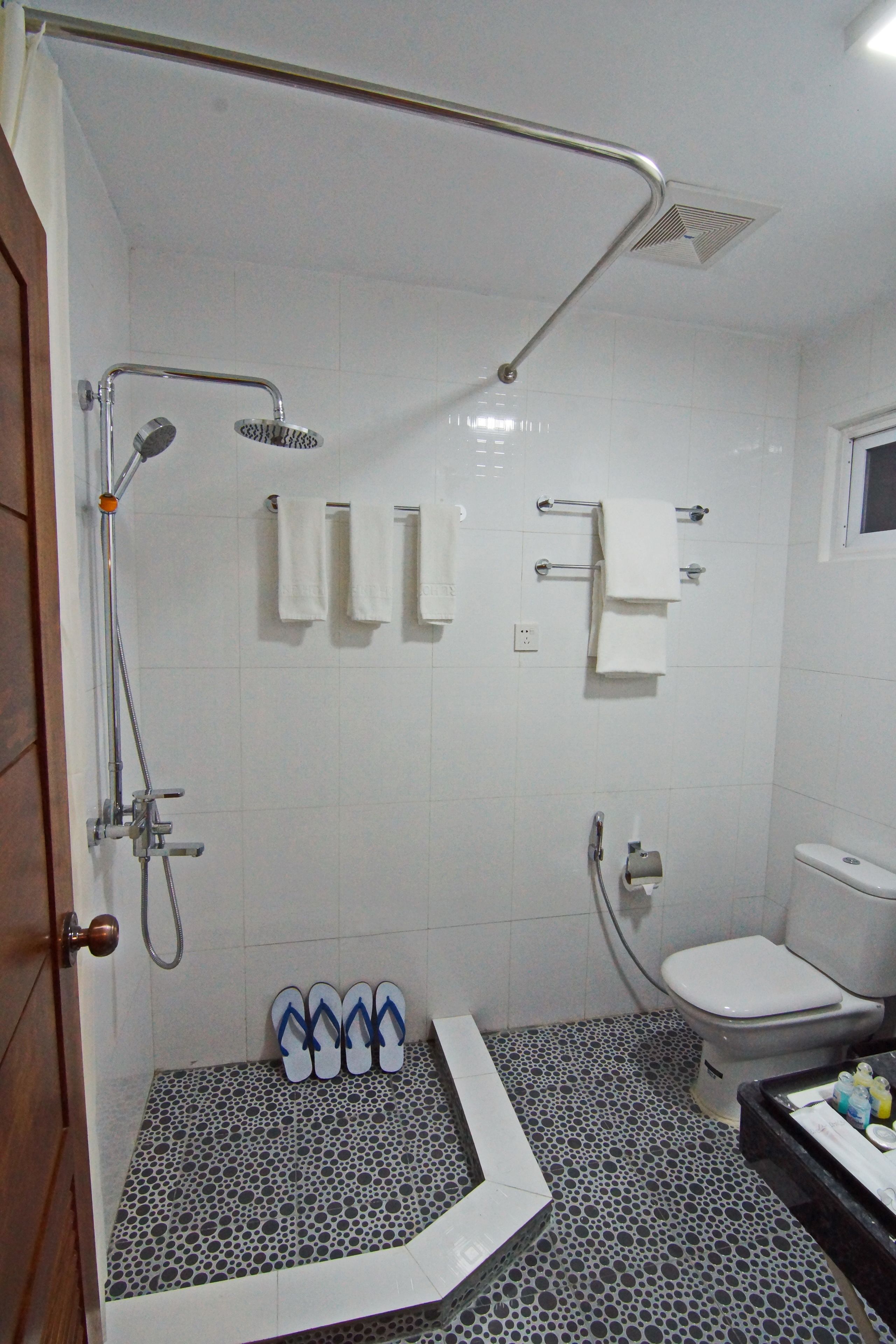 hair dryer, slippers, towels