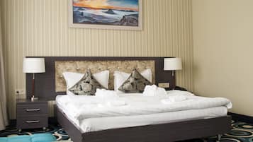 Ropa de cama de alta calidad y minibar