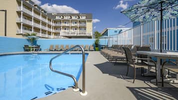 Outdoor pool, pool umbrellas, pool loungers
