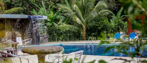 Outdoor pool, open 8:00 AM to 10:00 PM, pool loungers
