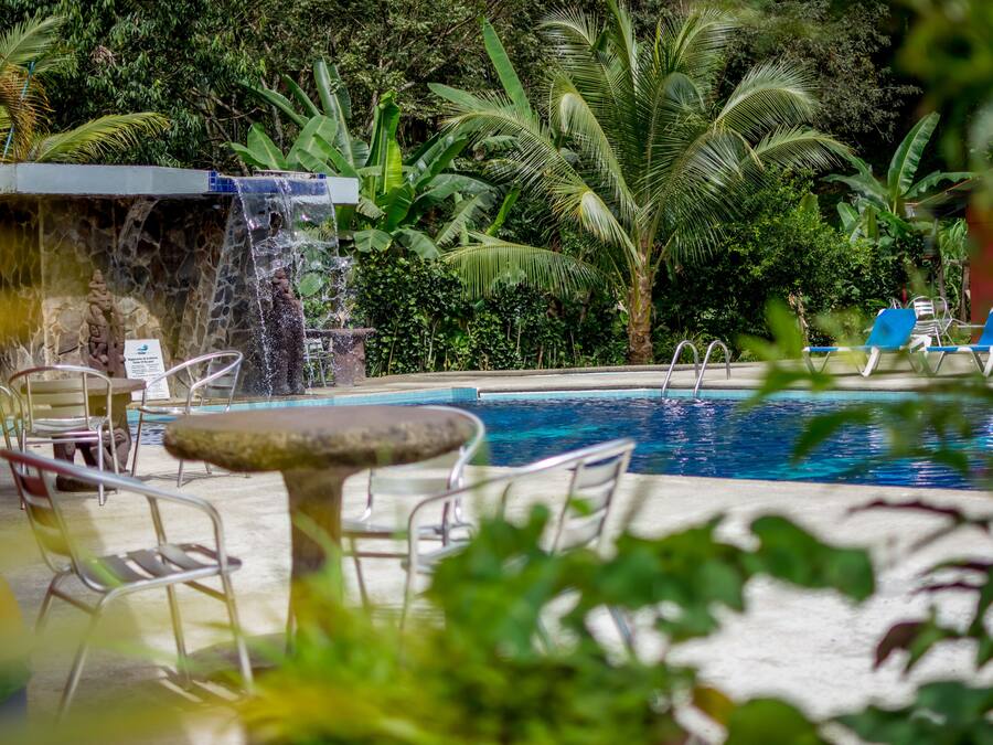 Outdoor pool, open 8:00 AM to 10:00 PM, sun loungers