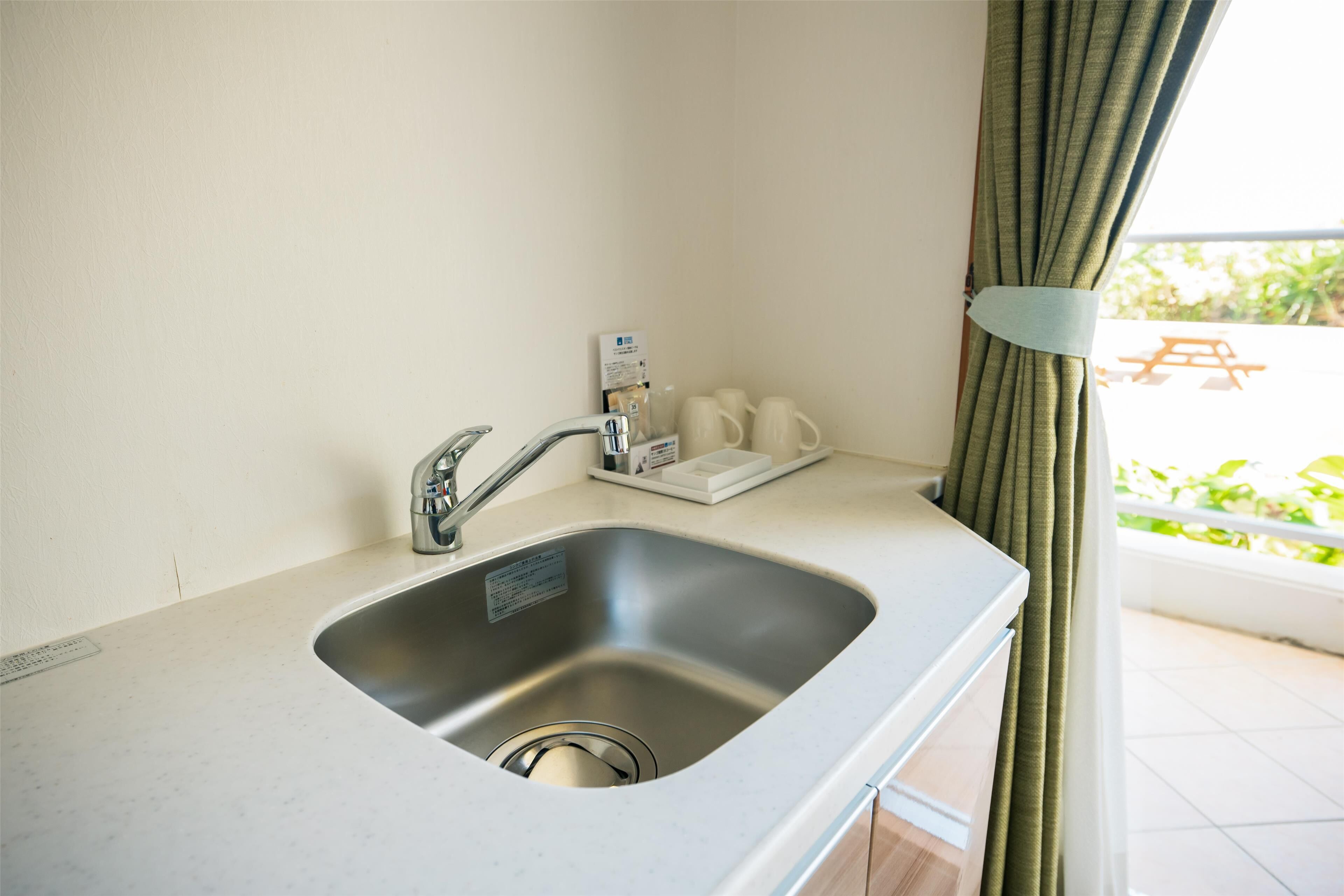 standard room, 2 single beds, non smoking, balcony (with extra bed) | private kitchenette | electric kettle