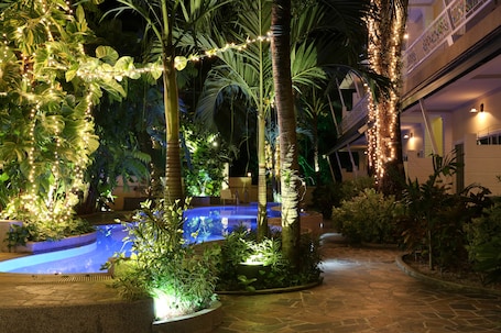 Outdoor pool, sun loungers. Naka Resort