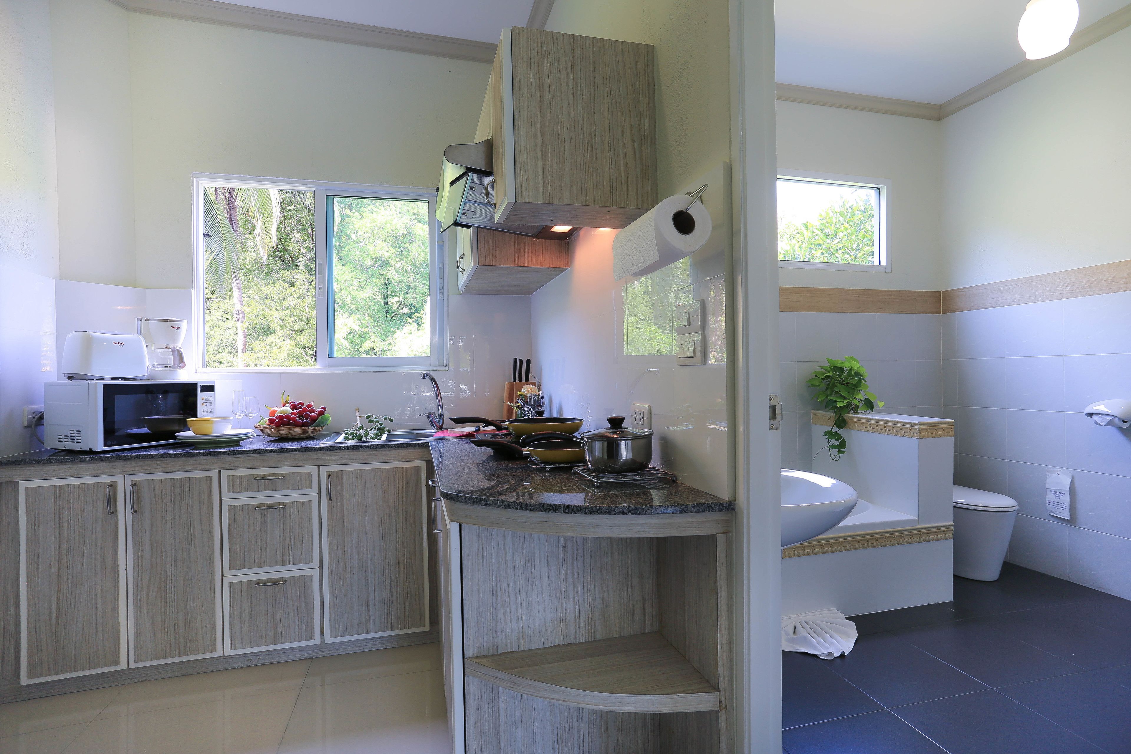 deluxe room | private kitchenette | fridge, coffee/tea maker