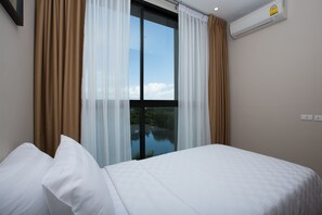 Suite – deluxe | 1 soverom, safe på rommet og blendingsgardiner