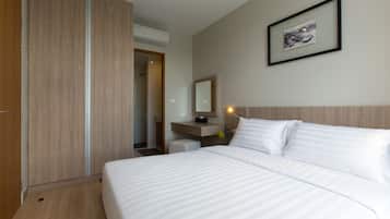 Junior suite | 1 slaapkamer, een kluis op de kamer, verduisterende gordijnen