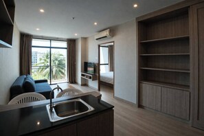 Junior Suite | Living area | LCD TV - Sugar Palm Residence (Phuket)