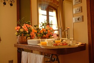 Deluxe Suite | Premium bedding, desk, laptop workspace, blackout drapes