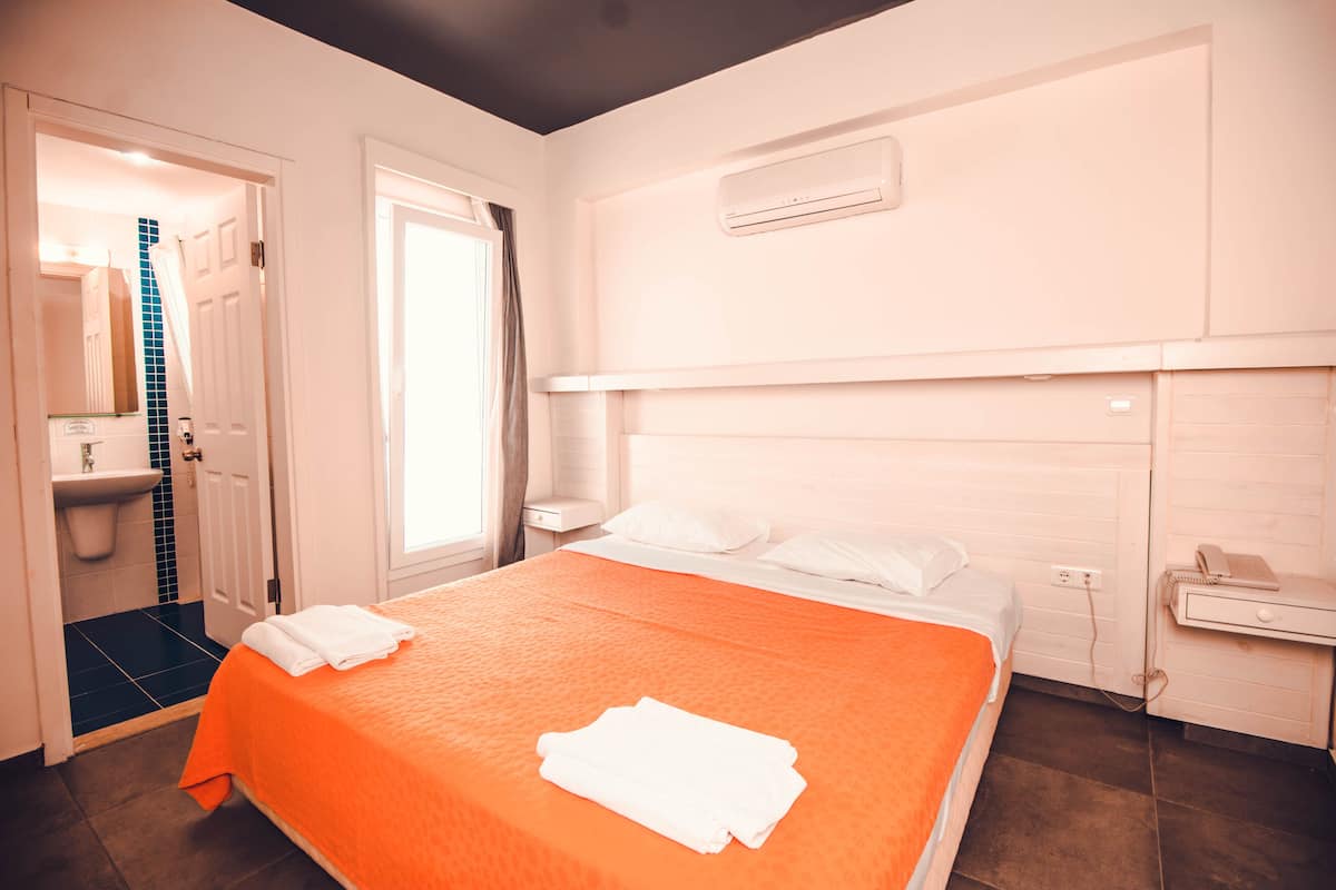 Family Apartment, 2 Bedrooms, 2 Bathrooms, Garden Area | 2 bedrooms, desk, iron/ironing board, free cots/infant beds