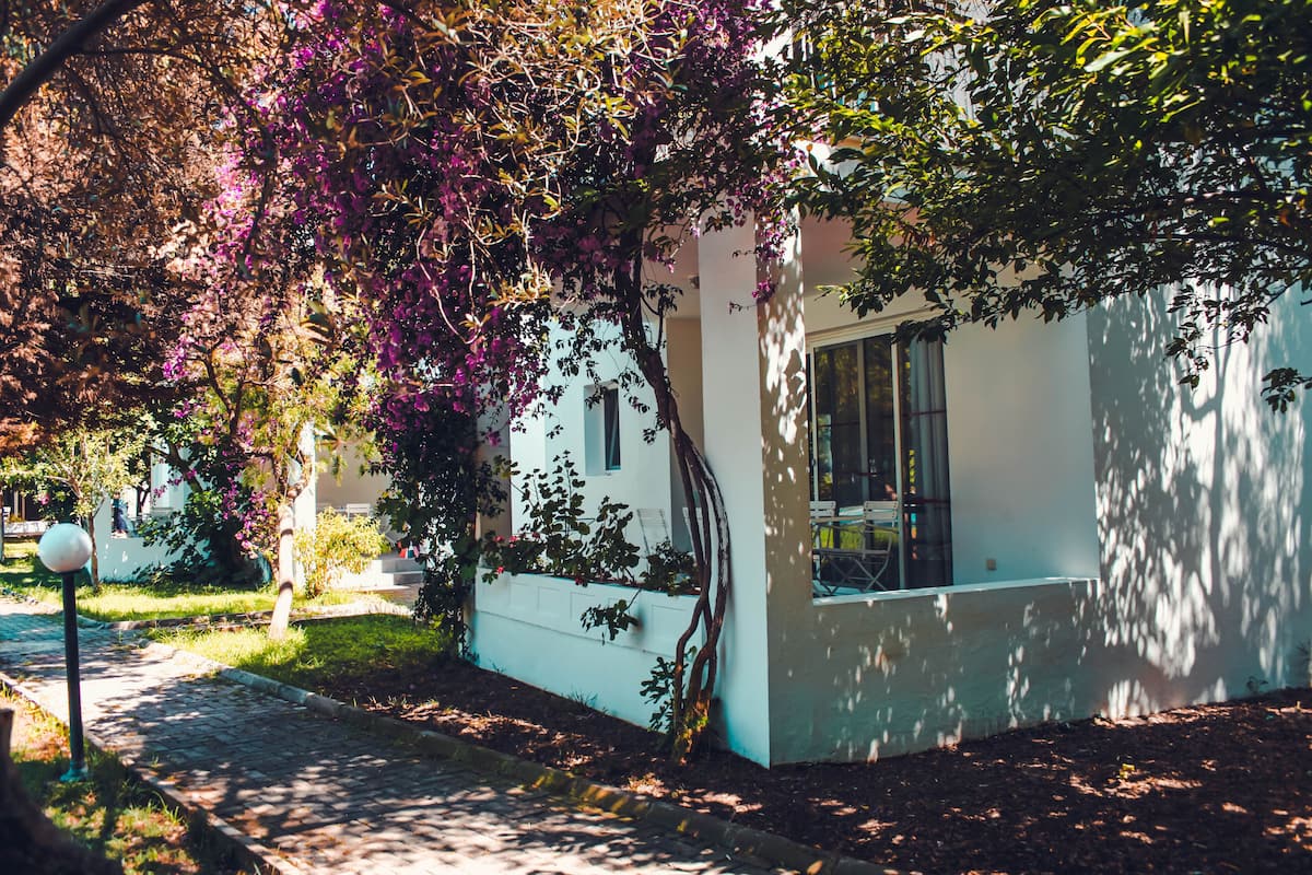 Family Apartment, 2 Bedrooms, 2 Bathrooms, Garden Area | 2 bedrooms, desk, iron/ironing board, free cots/infant beds