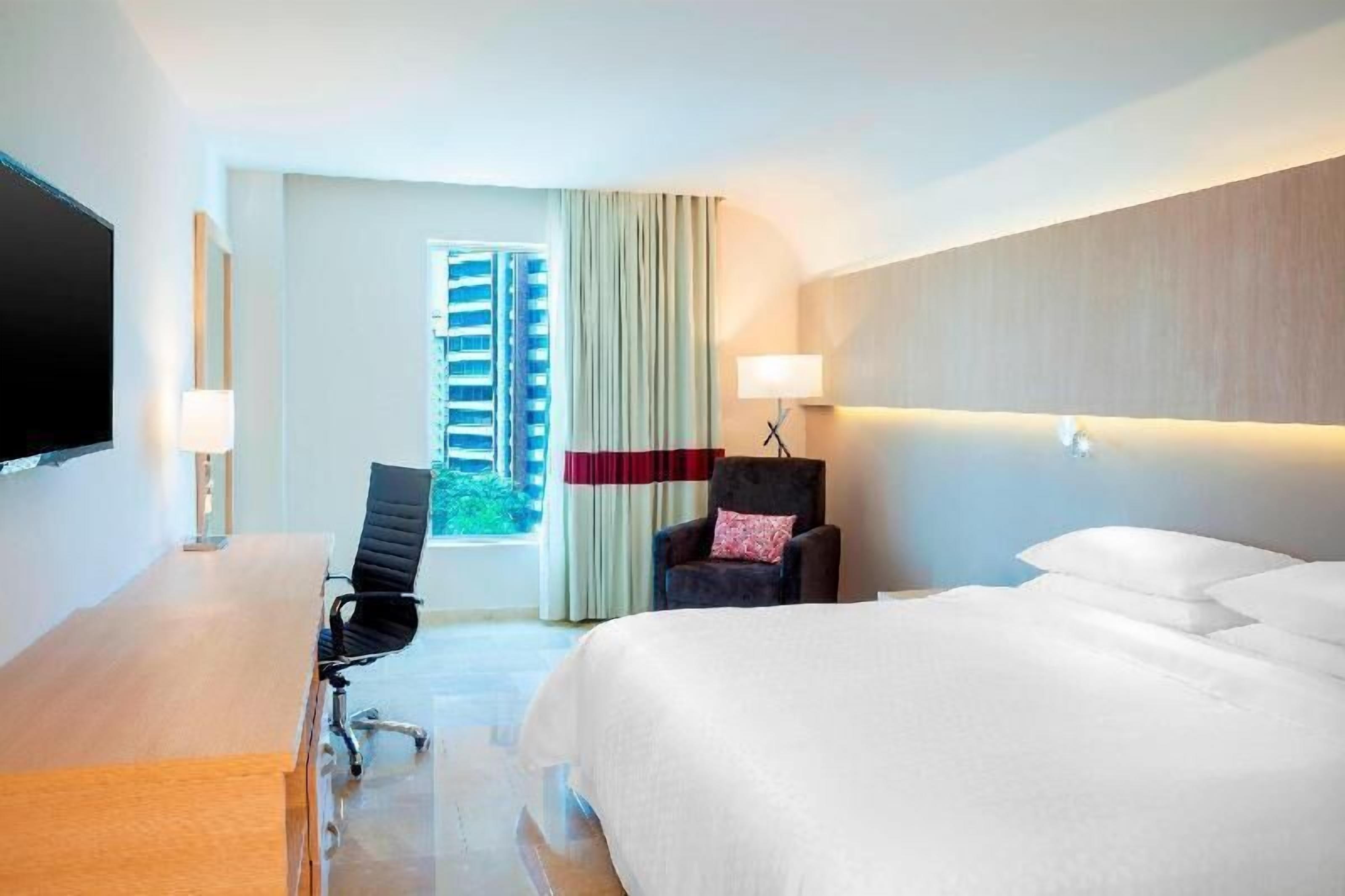 Ropa de cama de alta calidad y minibar 