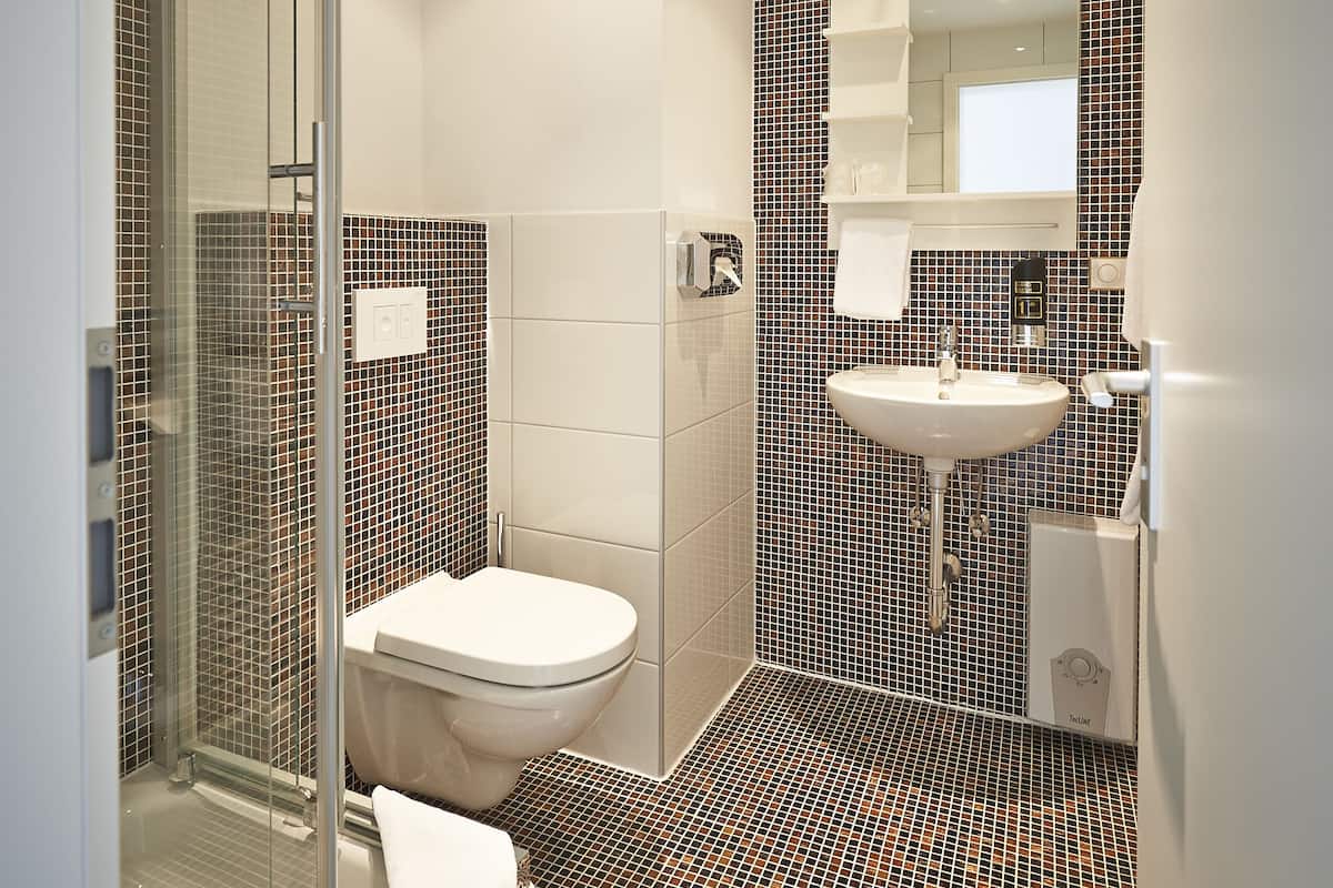 apartment | bathroom | shower, free toiletries, hair dryer, slippers