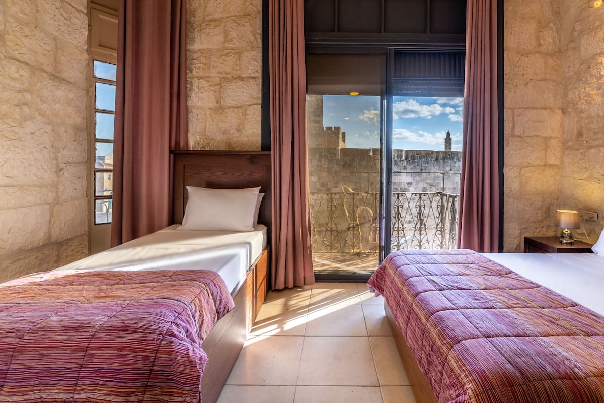 Comfort Room, 2 Bedrooms, City View | In-room safe, desk, iron/ironing board, free WiFi