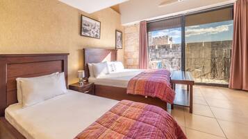 Superior Quadruple Room, Balcony, City View | In-room safe, desk, iron/ironing board, free WiFi