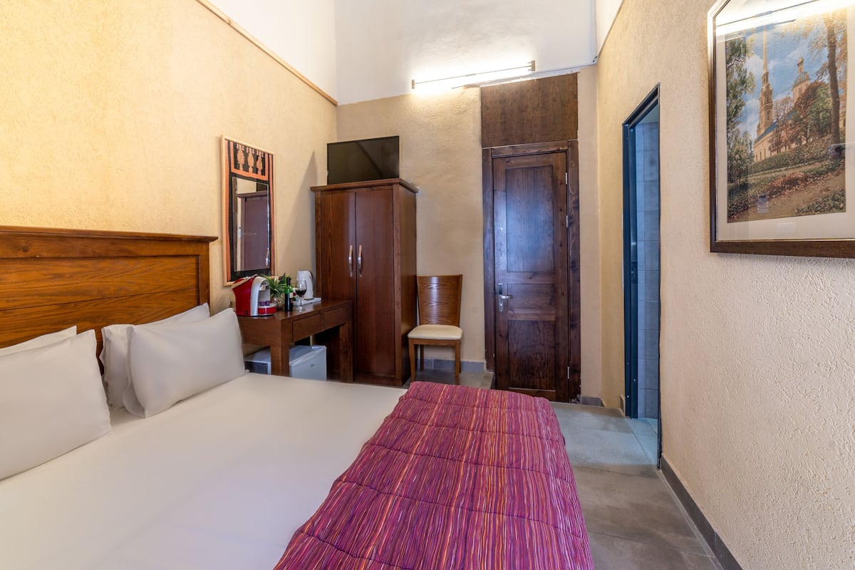 Small Double Room | 1 bedroom, in-room safe, desk, iron/ironing board