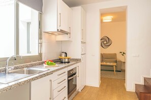 Duplex, 2 Bedrooms | Private kitchen | Full-size fridge, microwave, stovetop, coffee/tea maker - Feelathome Merced Apartments (Málaga)