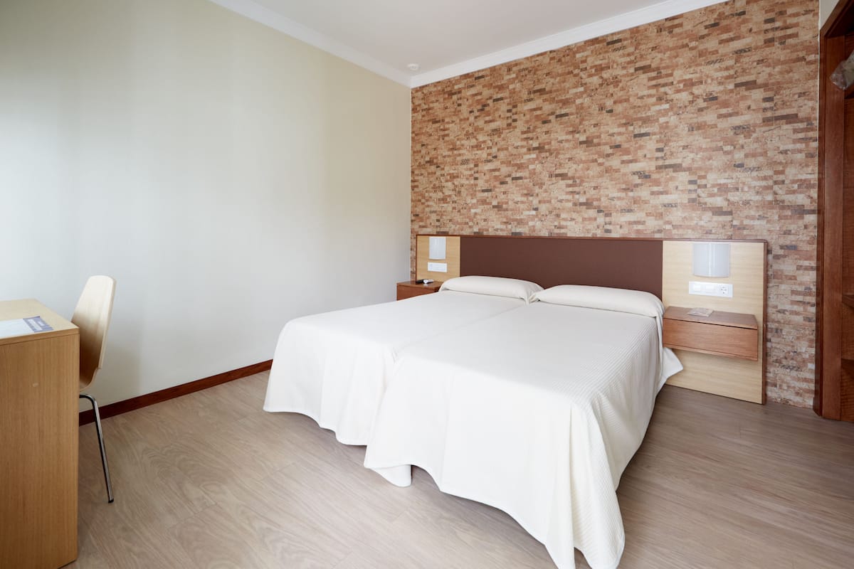 Double or Twin Room | Minibar, in-room safe, soundproofing, cribs/infant beds