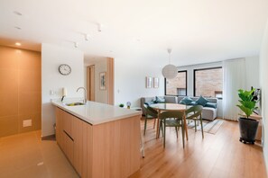 Apartment, 2 Bedrooms | Living area | 32-inch flat-screen TV with cable channels, TV, DVD player - Cora 96 Street Apartments (Bogotá)