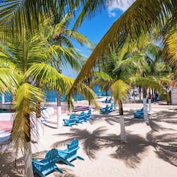 On the beach, sun-loungers, beach umbrellas, beach towels