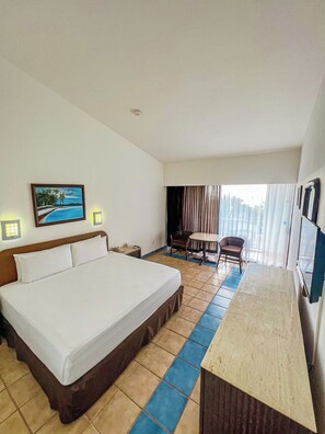 Standard Room, 1 King Bed | In-room safe, desk, iron/ironing board, bed sheets - Cozumel Hotel & Resort - All Inclusive (Cozumel)