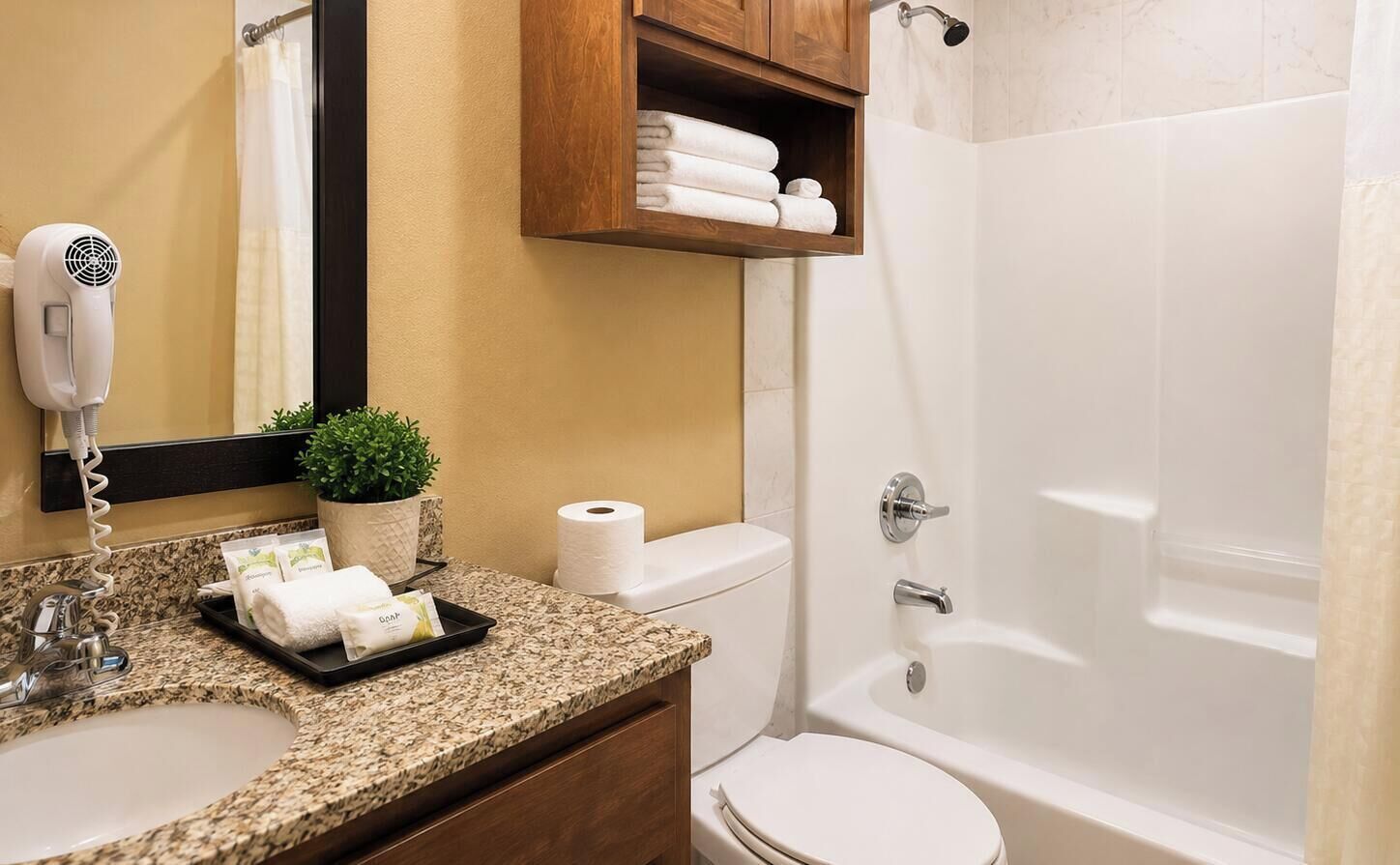 Bañera con ducha, artículos de tocador ecológicos, secador de pelo