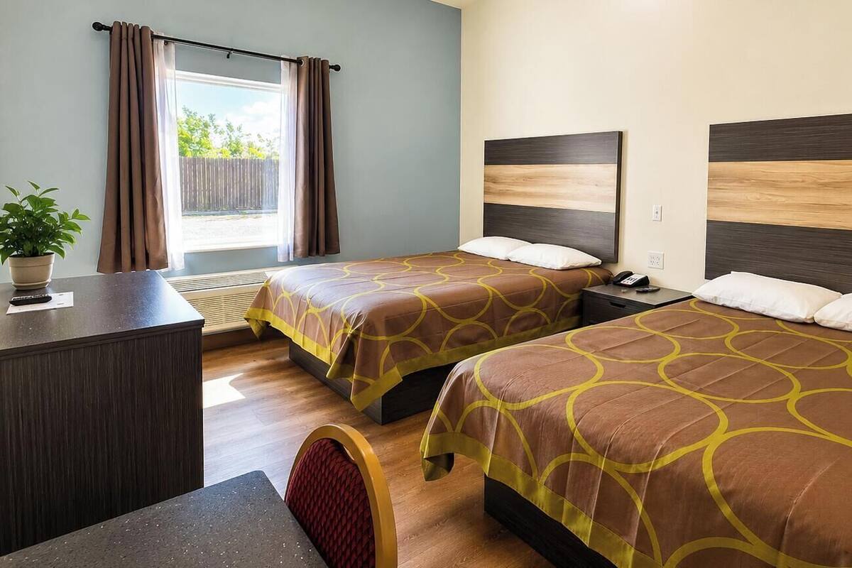 Economy Double Room, 2 Queen Beds, Non Smoking, Refrigerator & Microwave | Premium bedding, Tempur-Pedic beds, desk, laptop workspace