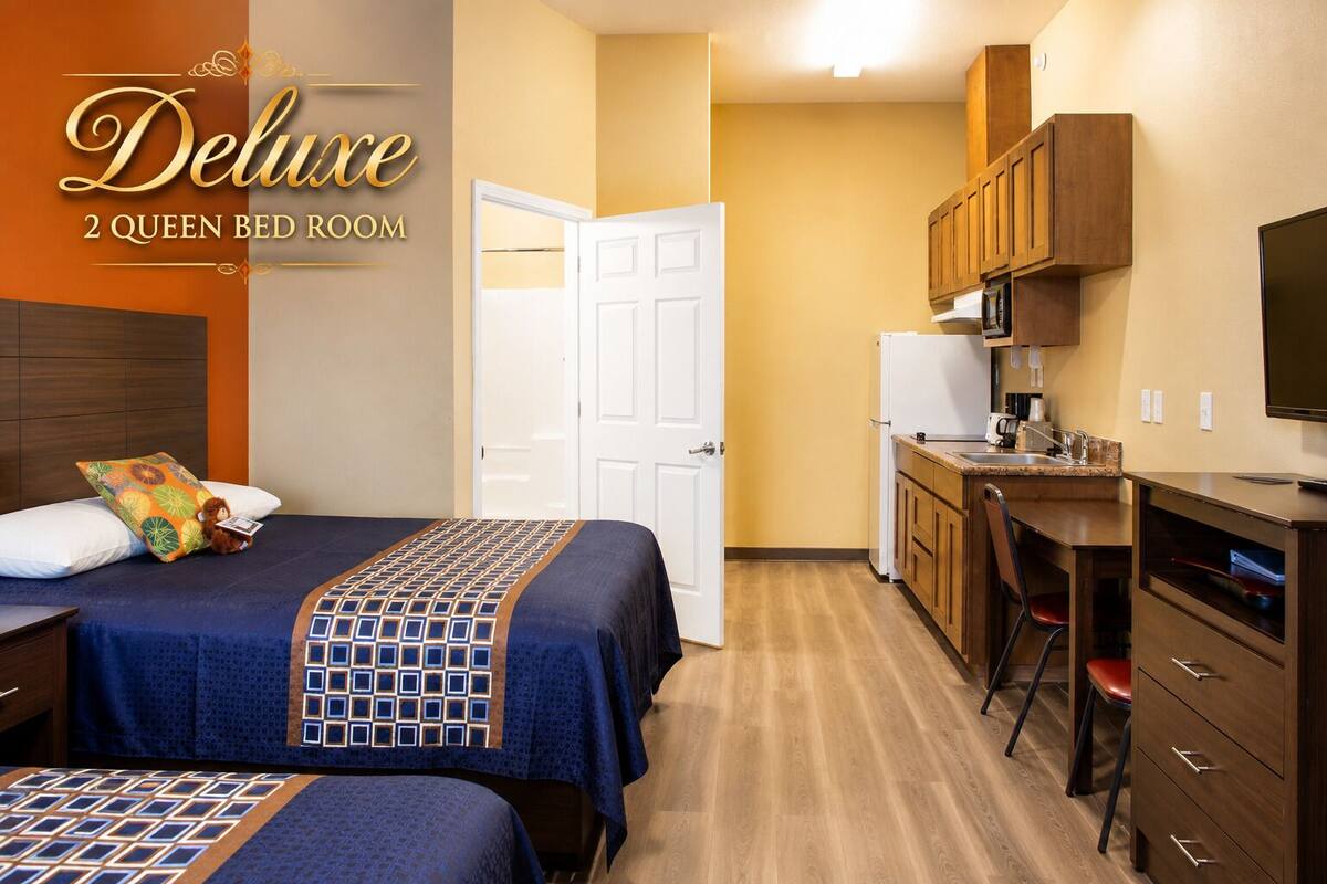 Premium bedding, Tempur-Pedic beds, desk, laptop workspace