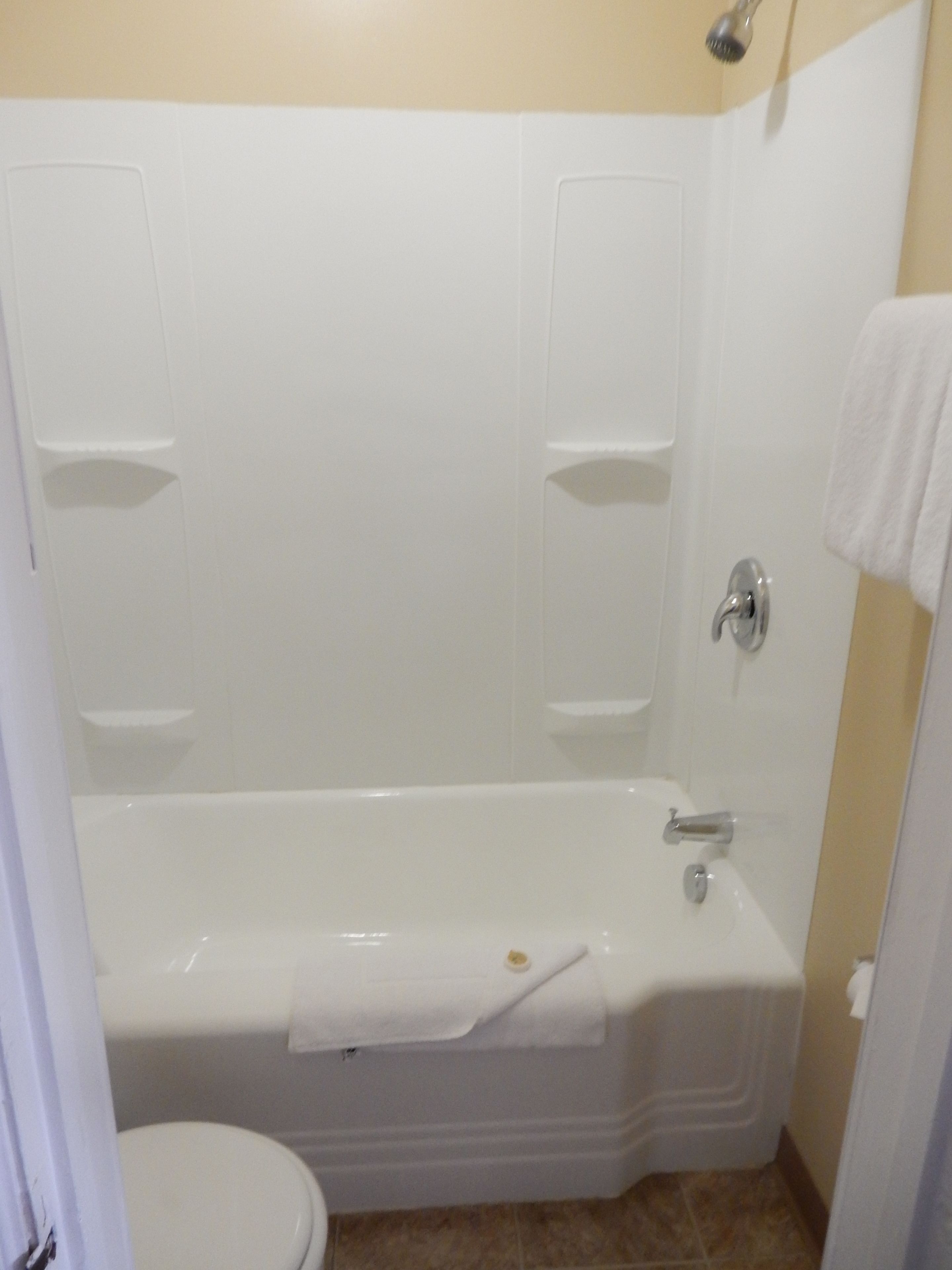 standard single room, 1 queen bed | bathroom | hair dryer, towels