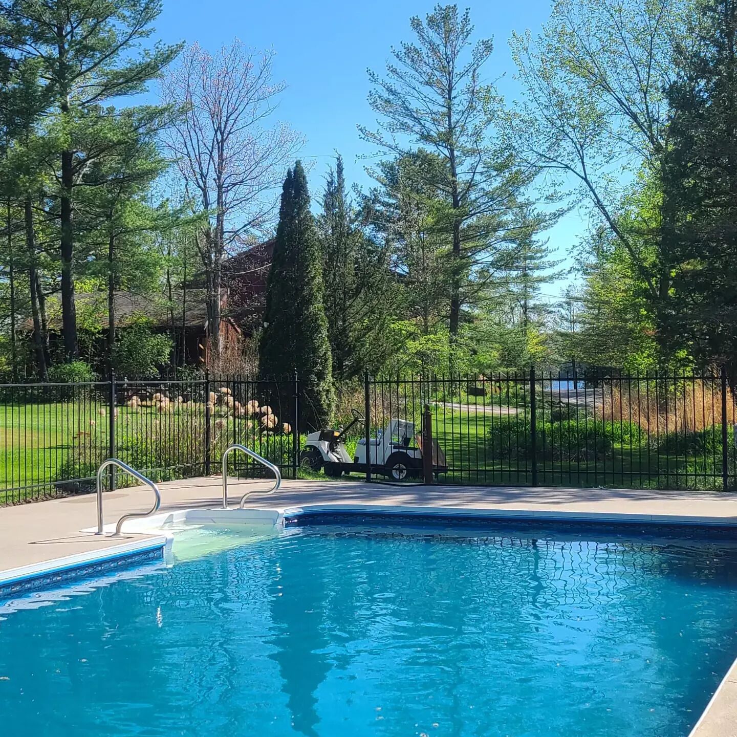 Seasonal outdoor pool, open 9:30 AM to 9:00 PM, pool umbrellas