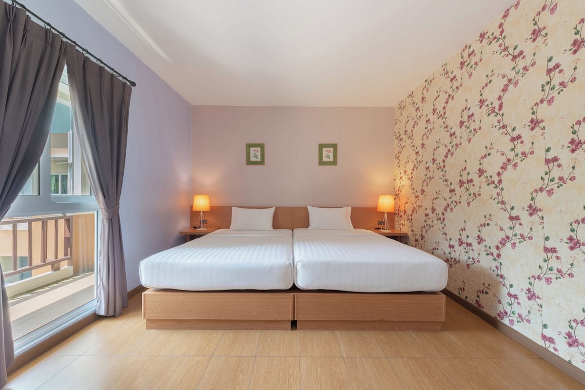 Chambre Deluxe | Minibar, rideaux occultants, Wi-Fi gratuit, draps fournis