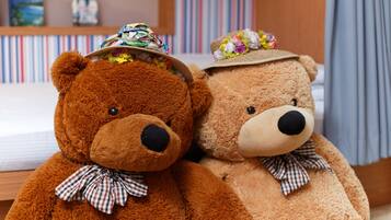 Family Room | Minibar, blackout drapes, free WiFi, bed sheets