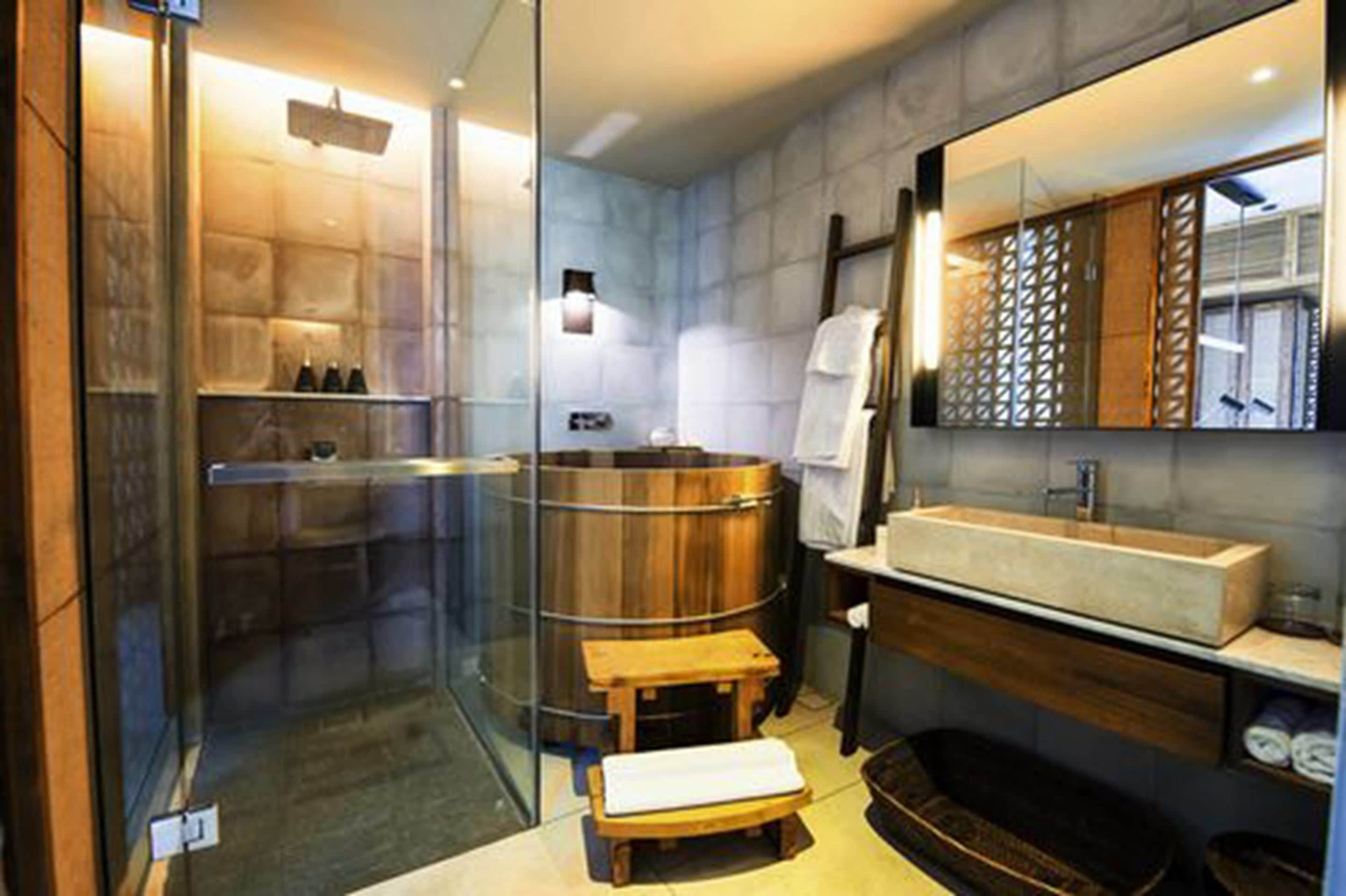 separate bathtub and shower, deep-soaking bathtub, rainfall showerhead