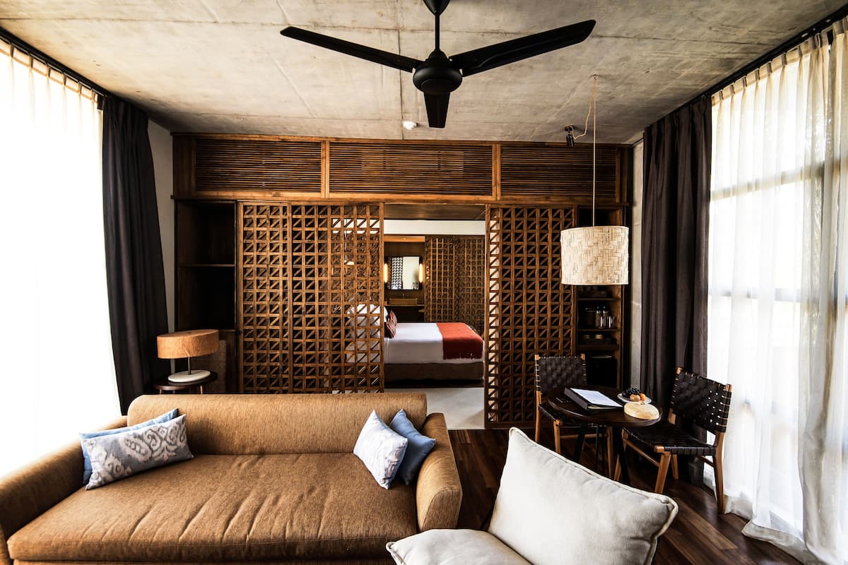 Suite, 1 King Bed (Garden) | 1 bedroom, premium bedding, down comforters, minibar