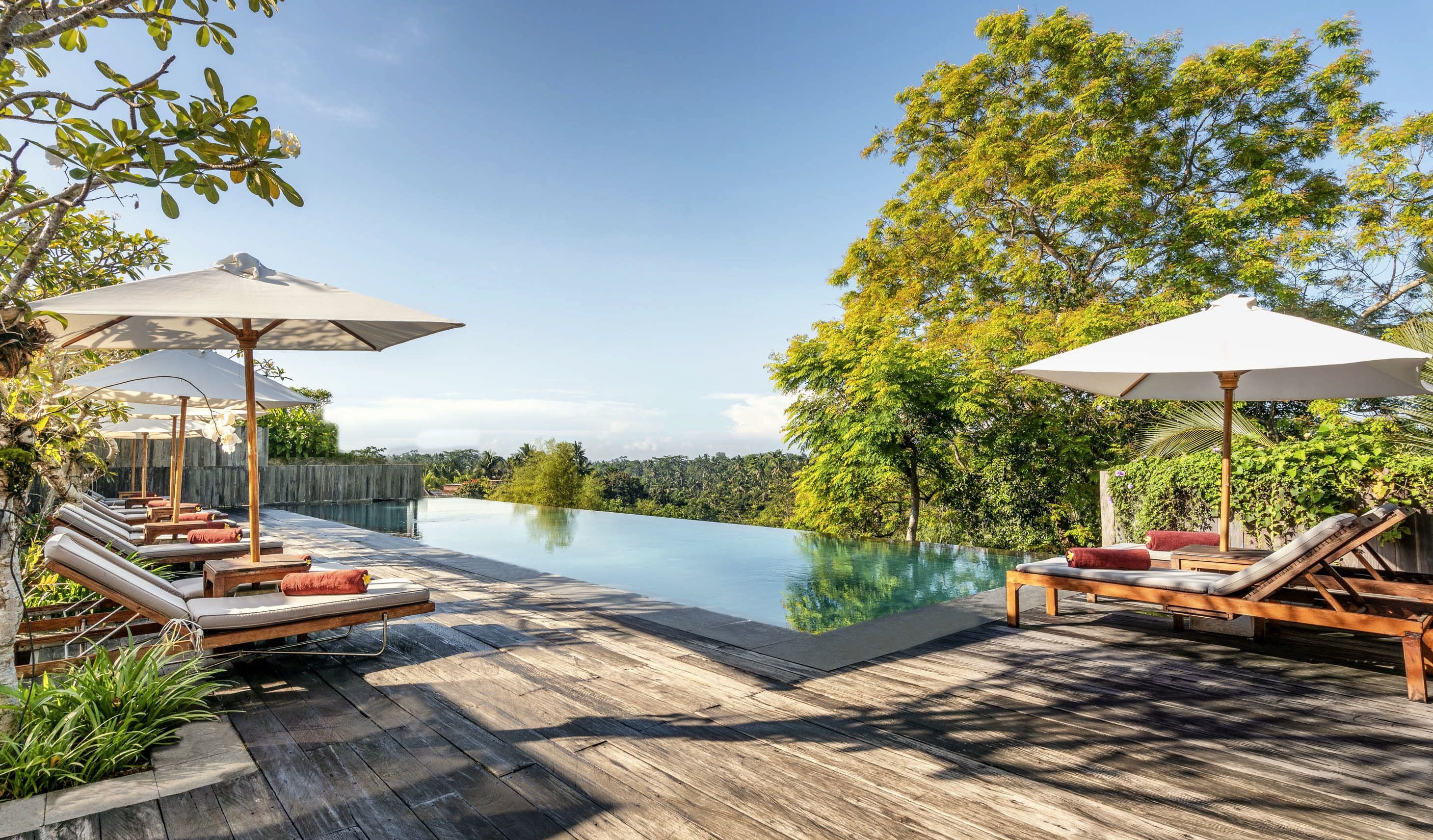 outdoor pool, open 7:00 am to 8:00 pm, pool umbrellas, pool loungers