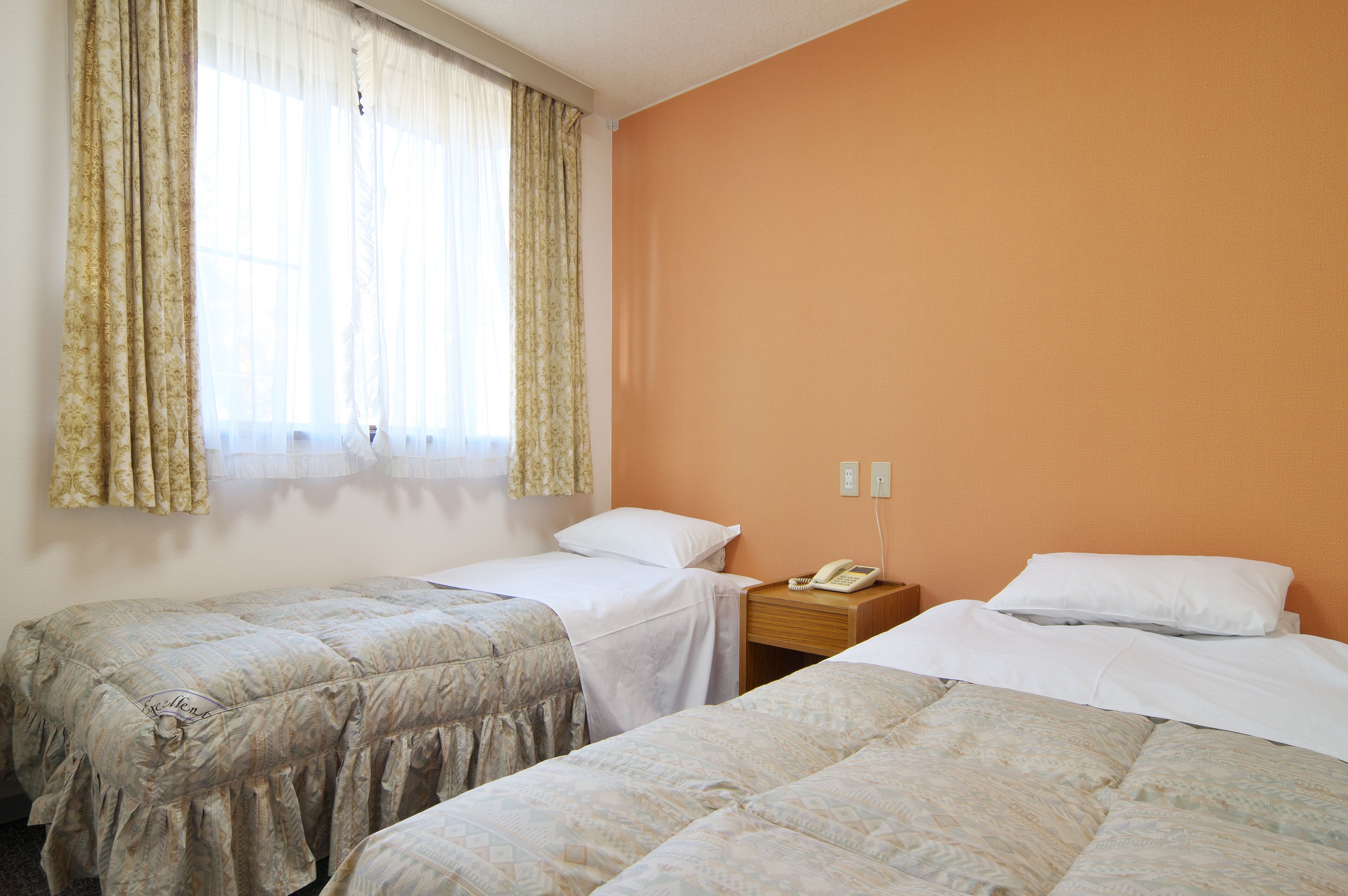 2 bedroom | in-room safe, desk, laptop workspace, blackout curtains