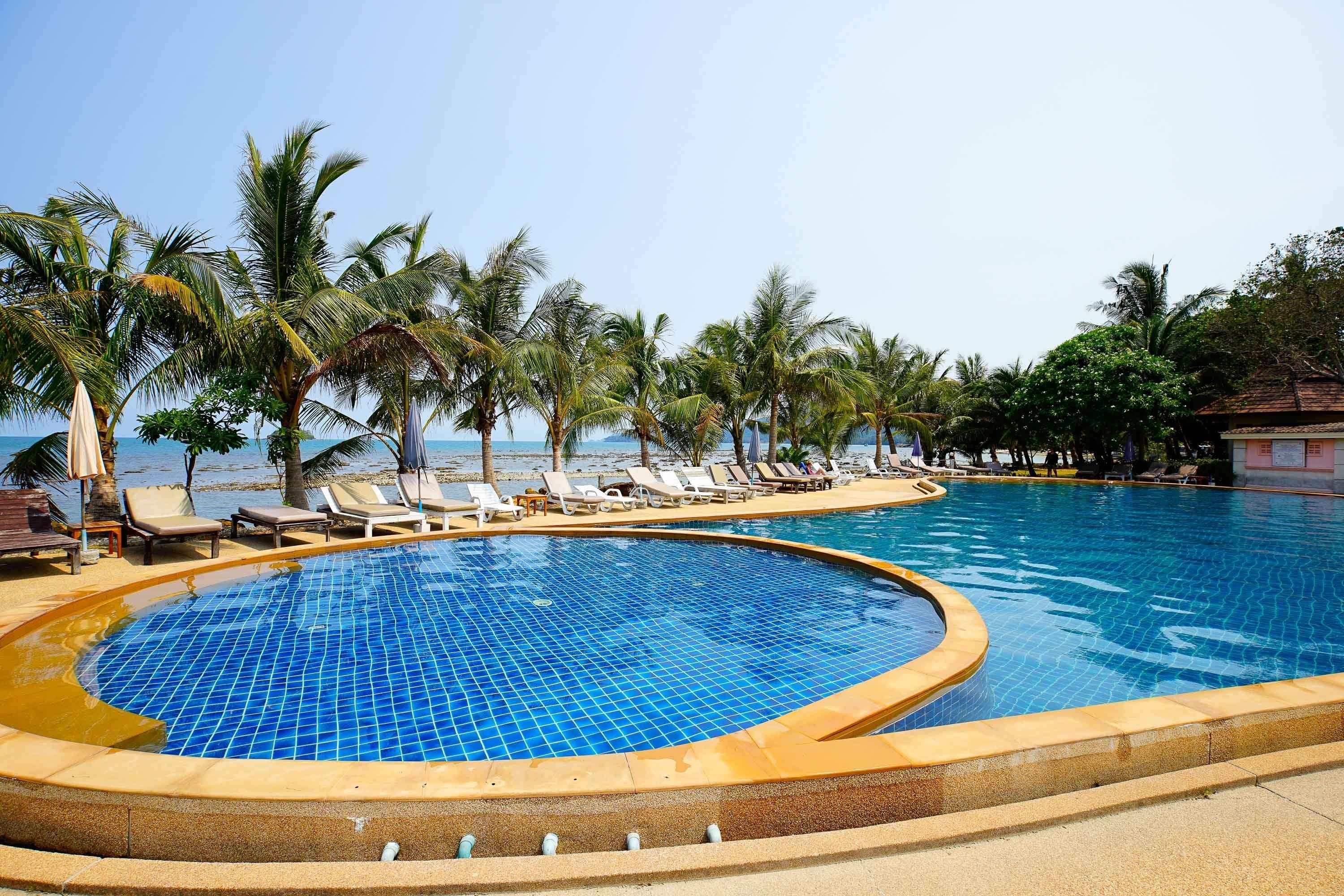Outdoor pool, pool umbrellas, pool loungers