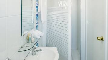 Shower, free toiletries, hair dryer, towels