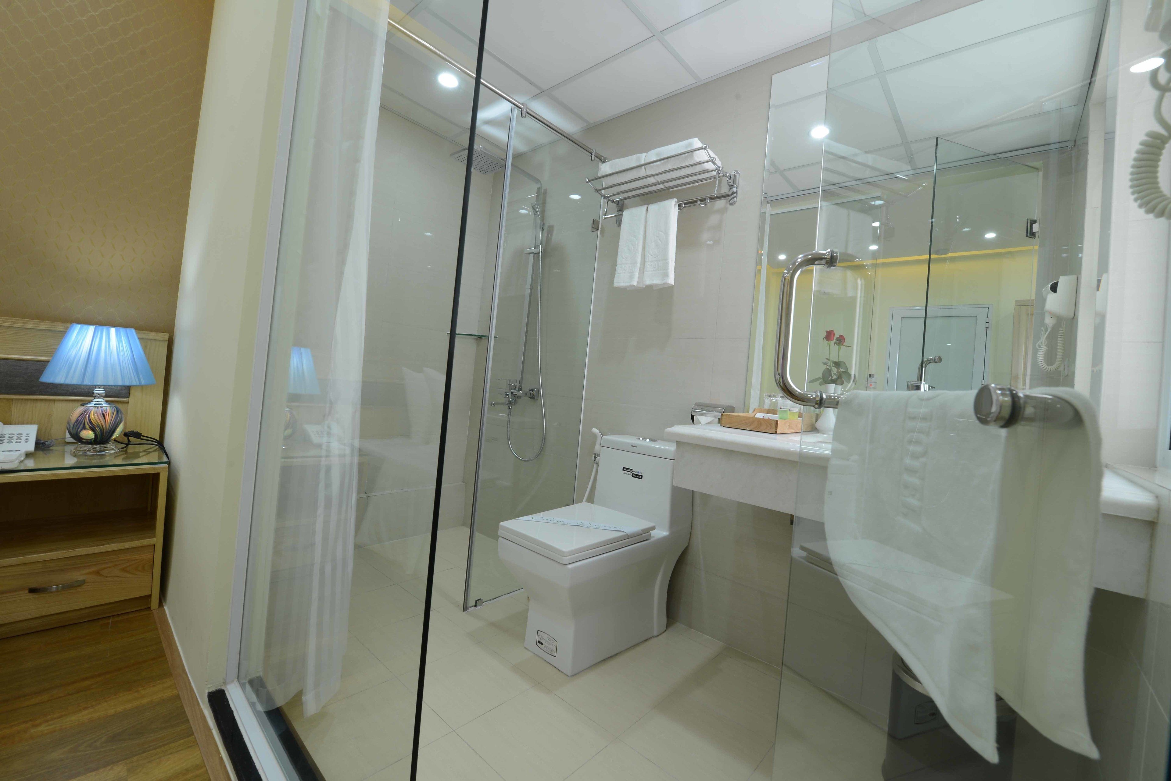 shower, free toiletries, hair dryer, slippers