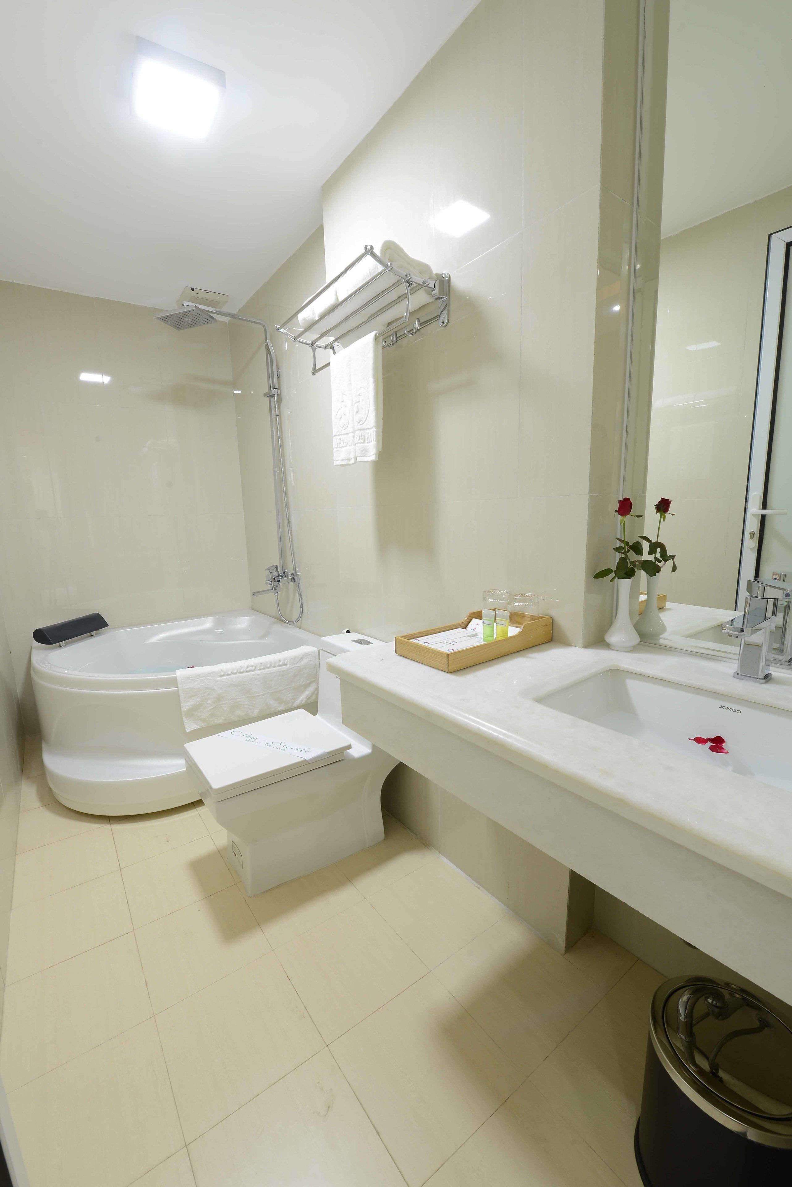 family room, city view | bathroom | shower, free toiletries, hair dryer, slippers
