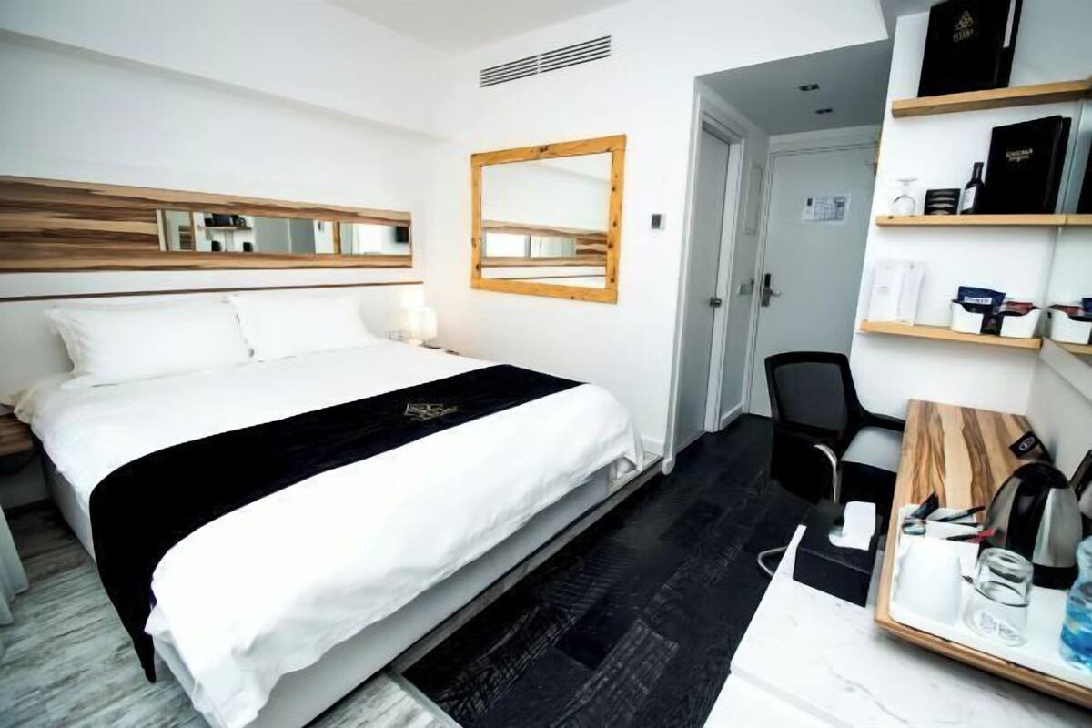 Ropa de cama de alta calidad y minibar
