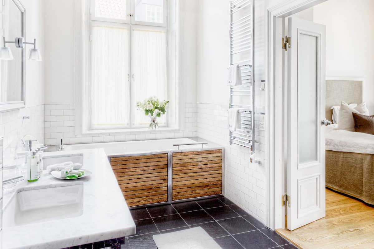 premium suite | bathroom | designer toiletries, hair dryer, bathrobes, heated floors