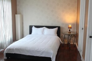 Blackout drapes, iron/ironing board, free WiFi, bed sheets